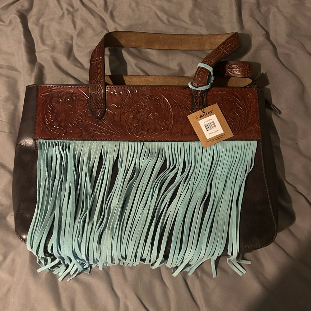 Brand new Ariat purse with tags still on it. I paid $180 for it, never used it.